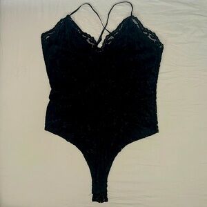 Black body suit. RUE21. Size Large